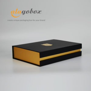 black and golden bookstyle box