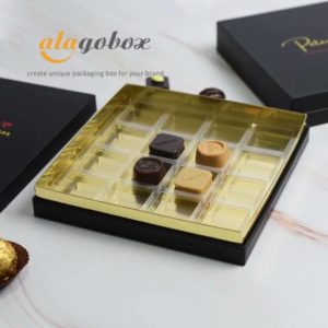 black and golden box with lid and shoulder